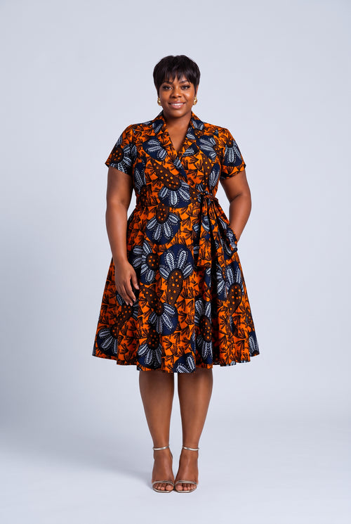 Front view plus size model wearing Marigold Bloom African wrap dress