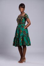 Side profile of Teal Flora rhinestone African print midi dress