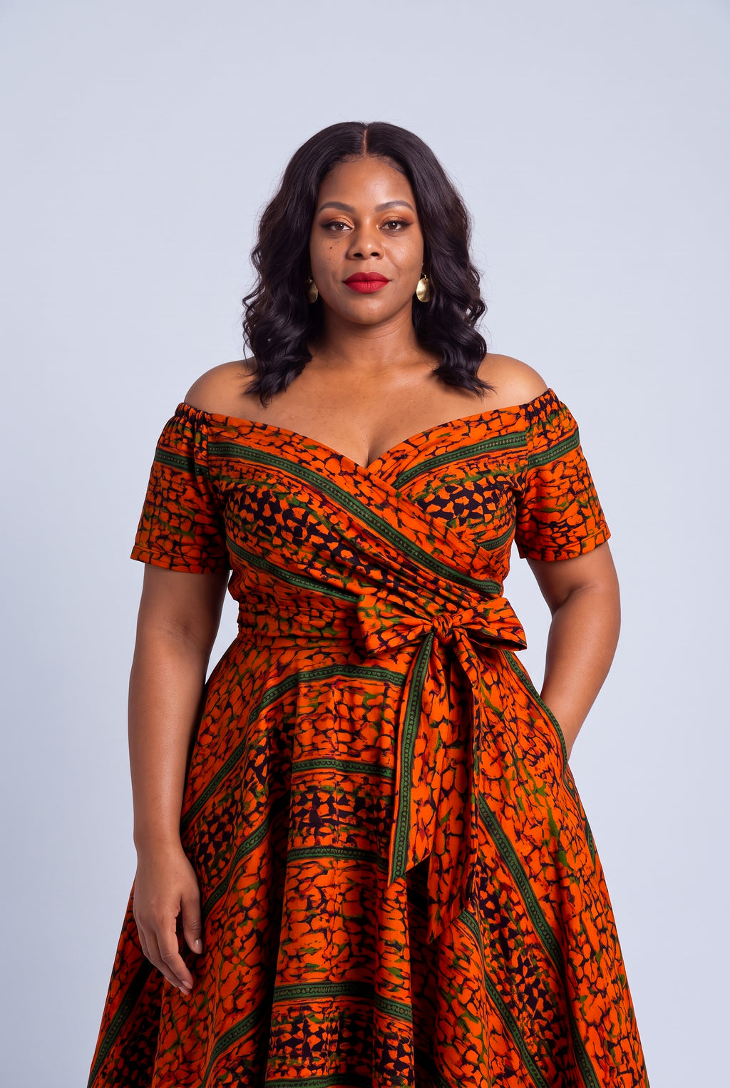 Close up of the elasticated off shoulder neckline on the Amber Horizon African print dress