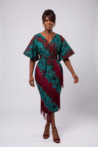Model walking in Burgundy Oasis African print occasion dress