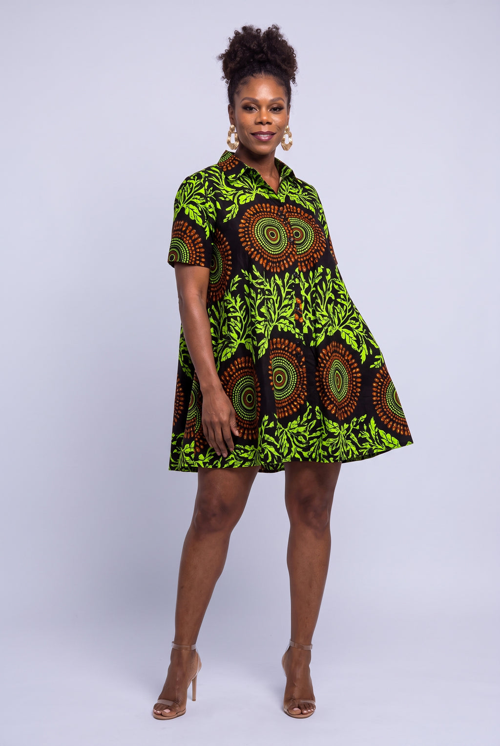 Front view of Lime Orbit short Ankara shirt dress with pointed collar and button front
