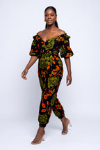 Model walking in Olive Oasis African print two piece outfit