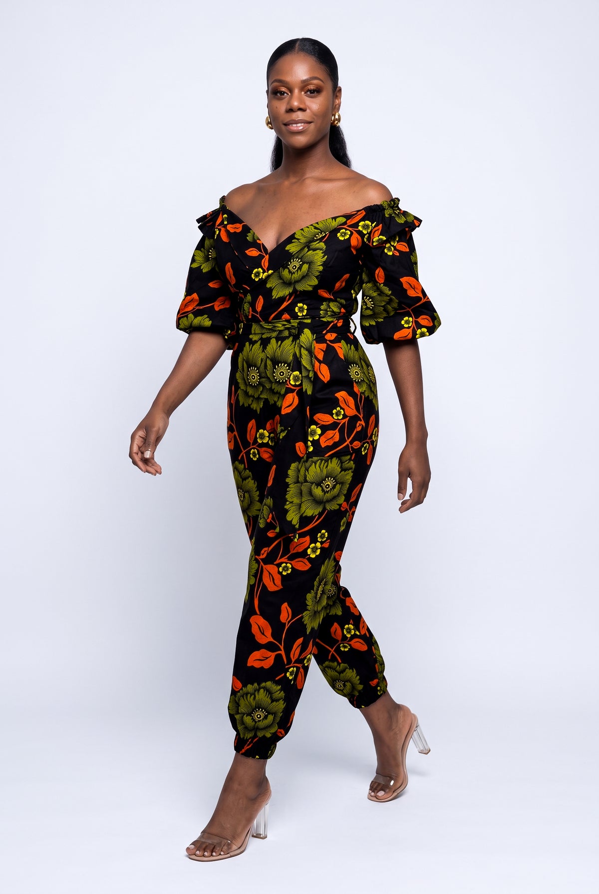 Model walking in Olive Oasis African print two piece outfit