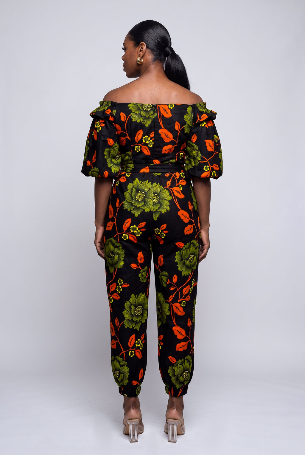 Back view of green African print wrap top and matching trousers