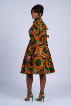 Back view of orange African print shirt dress with full circle skirt