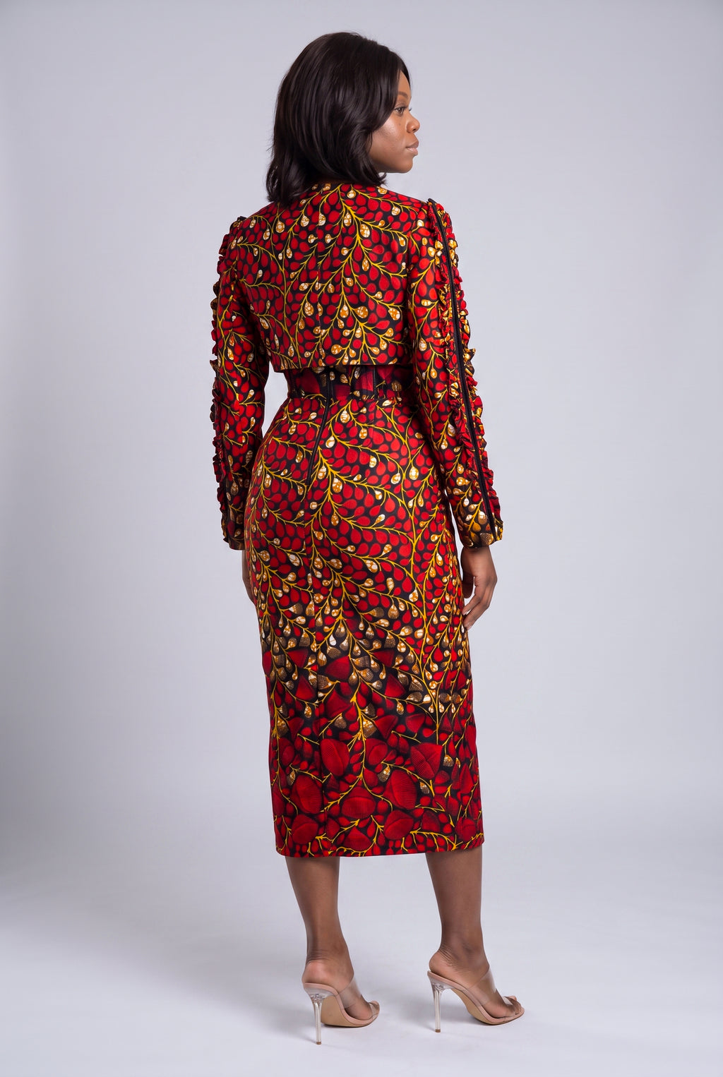 Back view of red African print corset midi dress and matching jacke