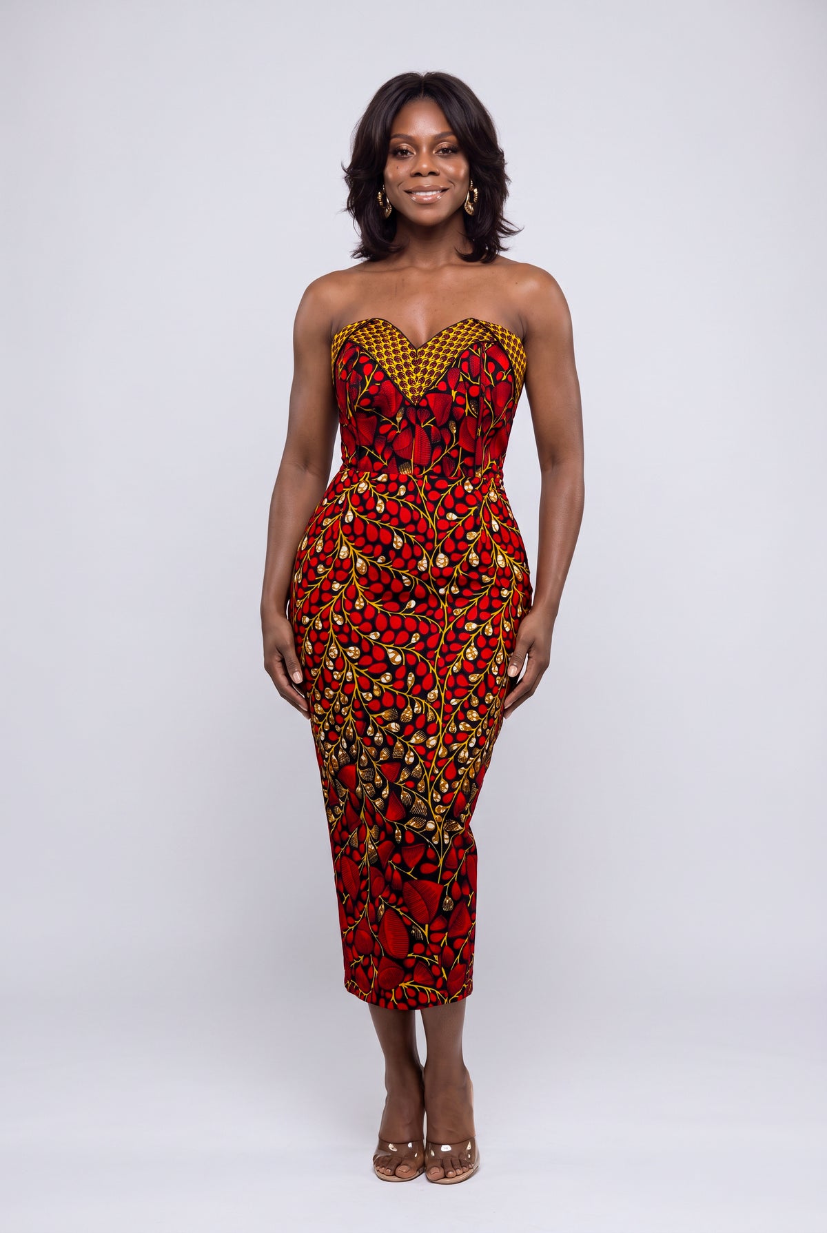 Front view of Red Vine red African print corset midi dress