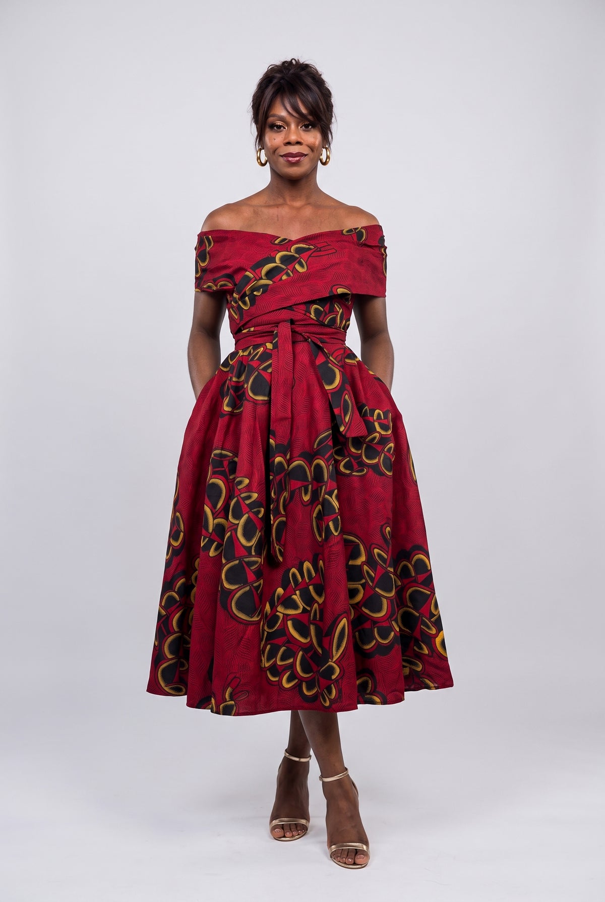 Front view of Ruby Fan red African print off shoulder dress