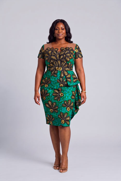 Plus size model wearing Teal Flora Ankara peplum dress