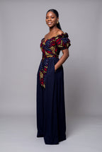 Three quarter view of Ruby Nova African print wrap top with solid Navy palazzo trouser