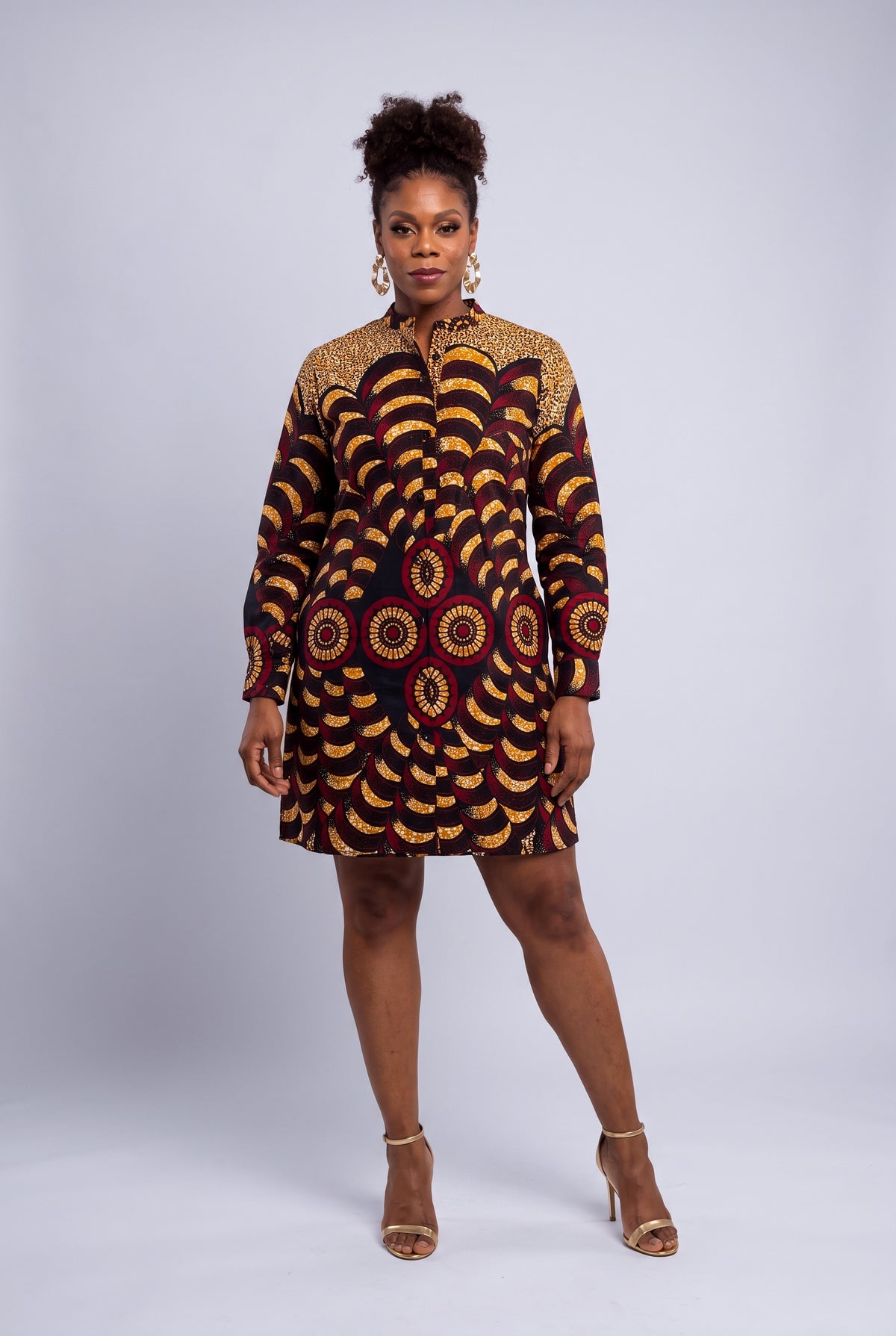 Model wearing Saffron Halo long sleeve Ankara shirt dress with a relaxed straight fit and above-knee length