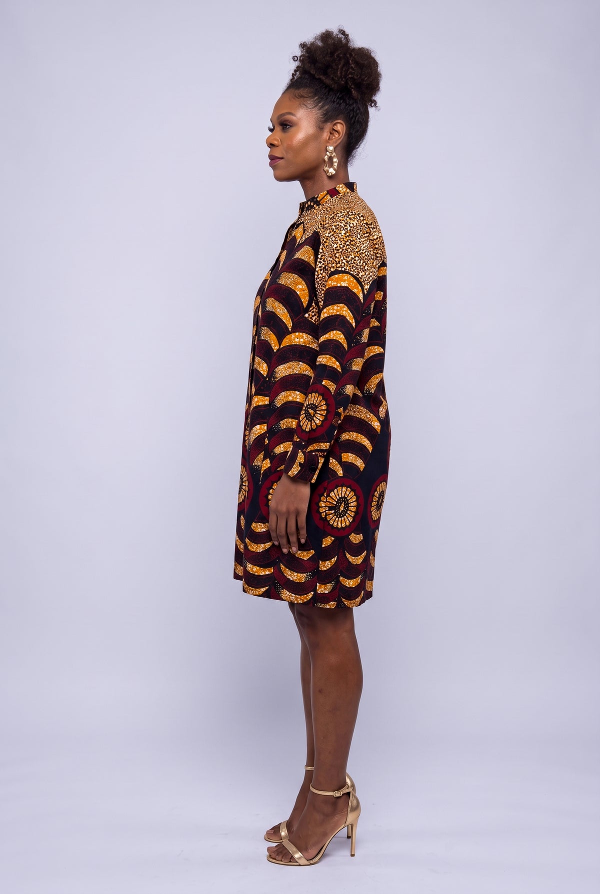 Side view of Saffron Halo Ankara dress with stand collar, long sleeves and relaxed straight silhouette
