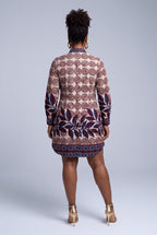 Back view of Spiral Vine cream African print shirt dress with burgundy and navy motifs
