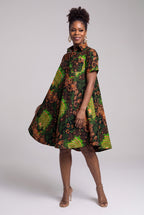 Three quarter view of Verdant Ripple African print swing shirt dress