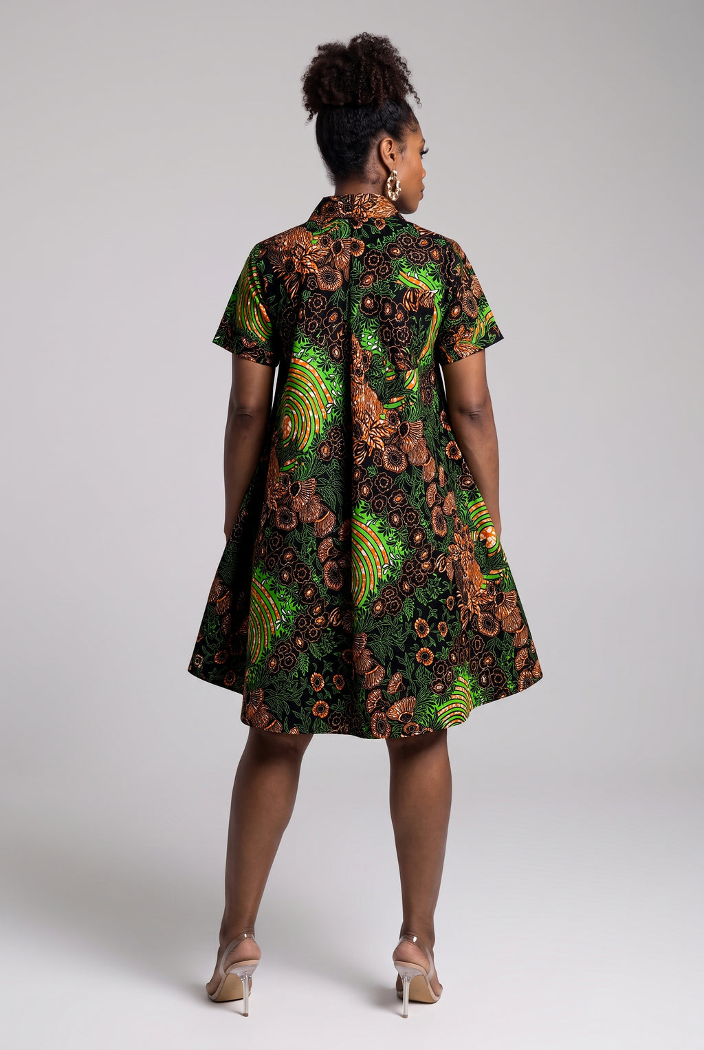  Back full length view of Verdant Ripple green African print swing shirt dress