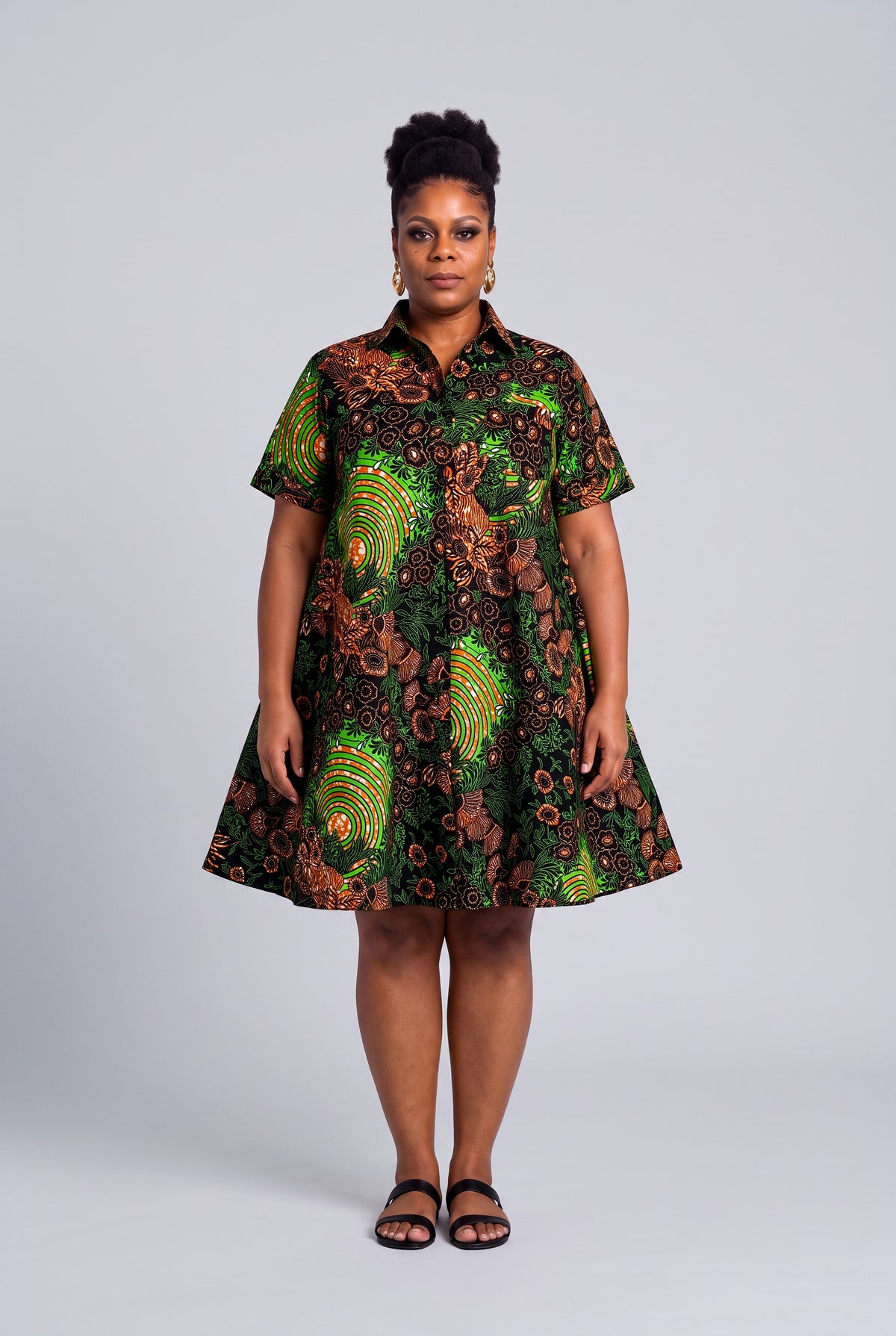  Plus size model wearing Verdant Ripple green Ankara swing shirt dress