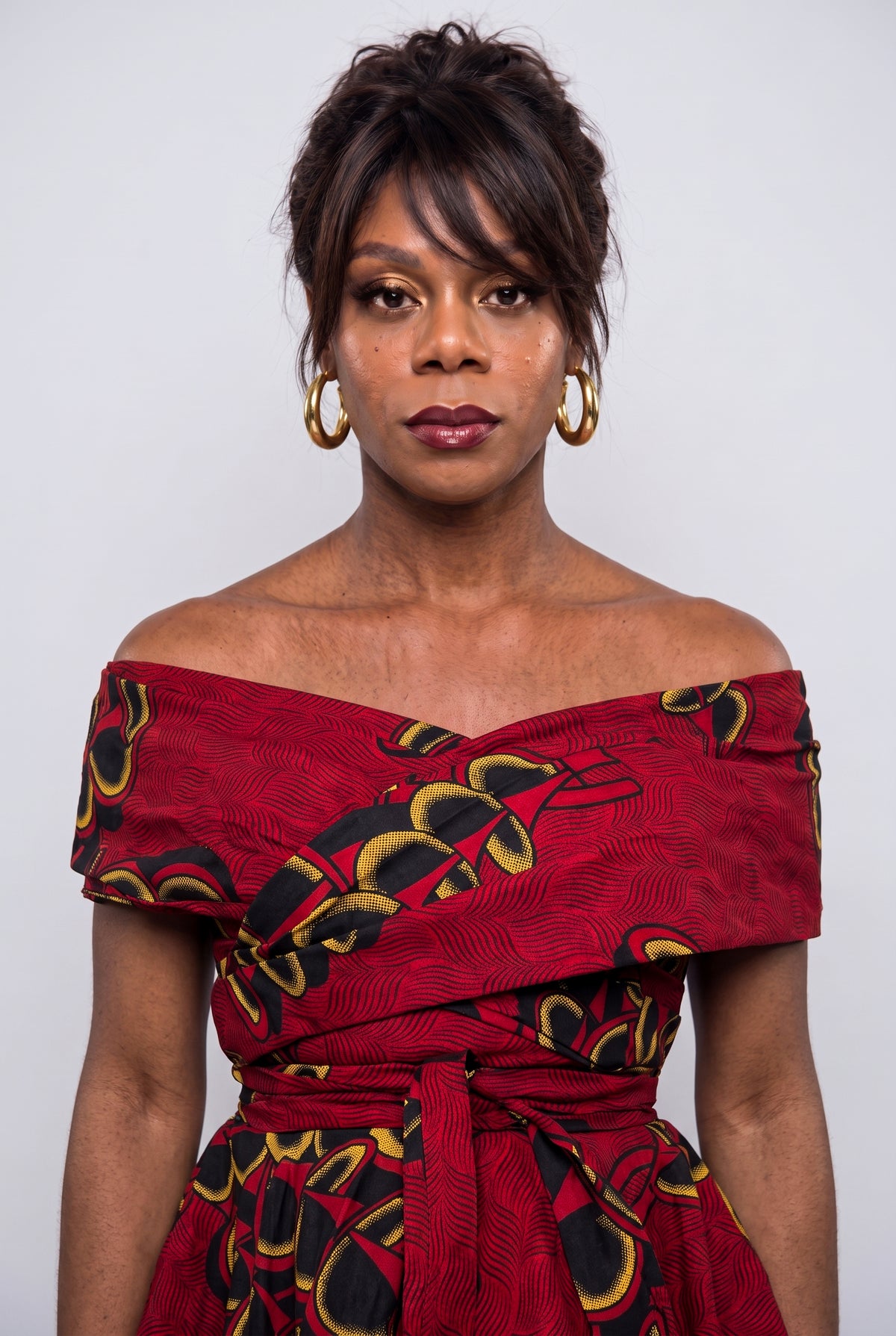 Close up of Ruby Fan off shoulder neckline and fitted bodice